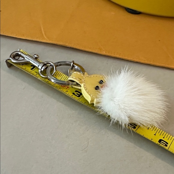 Coach Yellow and White Pom Pom Keychain - Picture 6 of 7